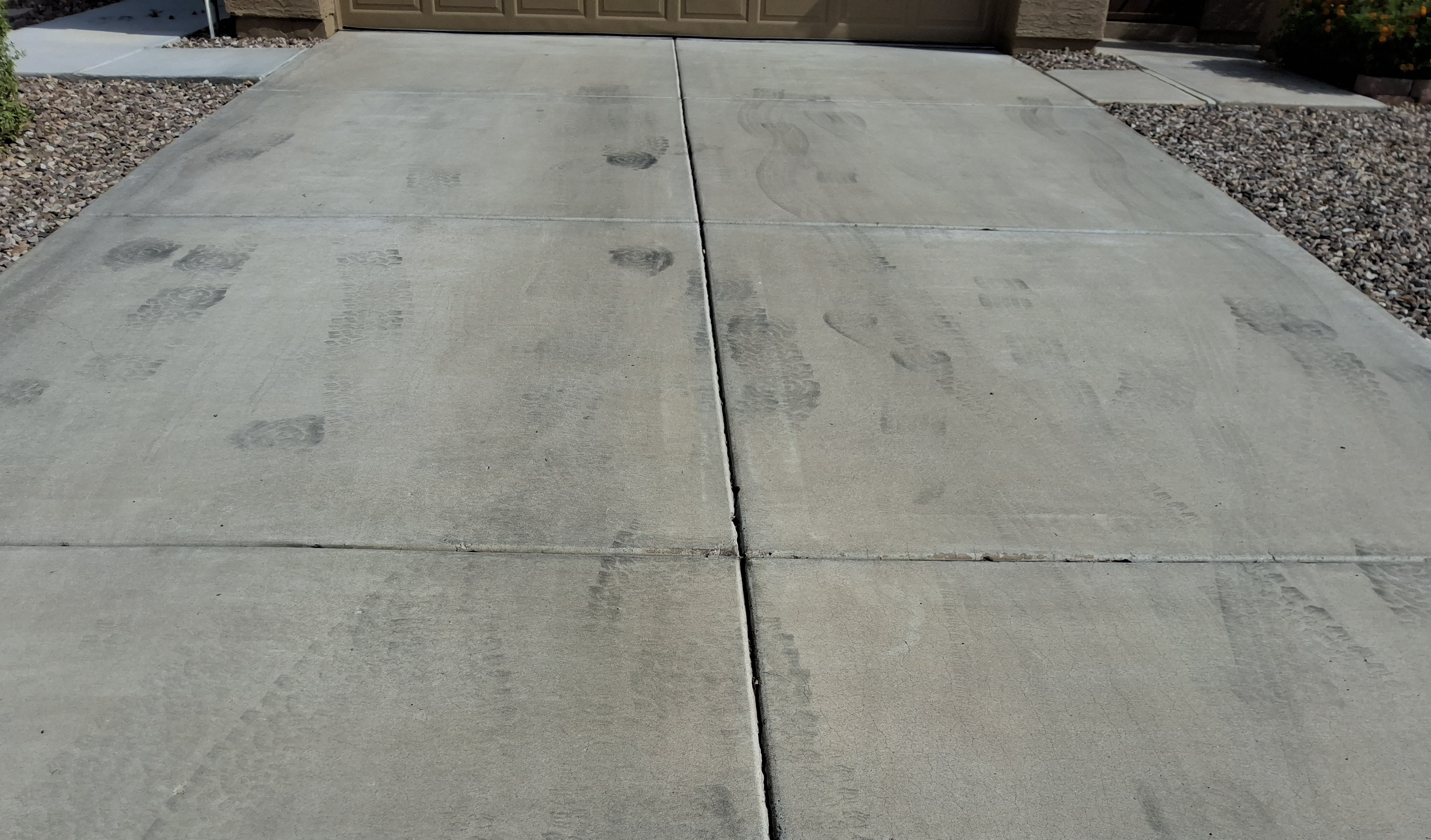 Concrete before power washing
